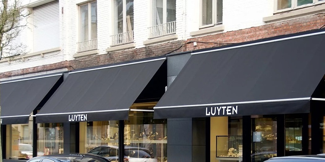 Uitvalscherm Luyten Turnhout vaste armen zonneschermen ideaal voor boetiek