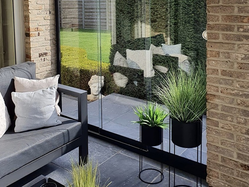 Glaswand Ravels - gehard glas - glaswanden - op maat gemaakt - naadloze overgang - glazen schuifwanden